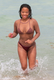 Miami, FL  - Christina Milian is on holiday in Miami. The singer puts her curves on display wearing a brown bikini paired with a long sleeve fishnet top. Christina cools off on a hot Summer day by taking a dip in the water.  Pictured: Christina Milian  BACKGRID USA 22 JULY 2017  BYLINE MUST READ: FAMA / BACKGRID  USA: +1 310 798 9111 / usasales@backgrid.com  UK: +44 208 344 2007 / uksales@backgrid.com  *UK Clients - Pictures Containing Children
Please Pixelate Face Prior To Publication*