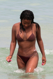 Miami, FL  - Christina Milian is on holiday in Miami. The singer puts her curves on display wearing a brown bikini paired with a long sleeve fishnet top. Christina cools off on a hot Summer day by taking a dip in the water.  Pictured: Christina Milian  BACKGRID USA 22 JULY 2017  BYLINE MUST READ: FAMA / BACKGRID  USA: +1 310 798 9111 / usasales@backgrid.com  UK: +44 208 344 2007 / uksales@backgrid.com  *UK Clients - Pictures Containing Children
Please Pixelate Face Prior To Publication*