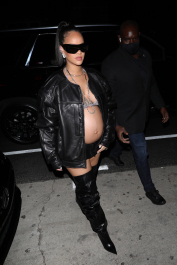 Santa Monica, CA  - *EXCLUSIVE*  - Rihanna shows off her burgeoning baby bump as she leaves Giorgio Baldi restaurant after having dinner with friends in Santa Monica. Shot on 03/12/22.  Pictured: Rihanna  BACKGRID USA 13 MARCH 2022  USA: +1 310 798 9111 / usasales@backgrid.com  UK: +44 208 344 2007 / uksales@backgrid.com  *UK Clients - Pictures Containing Children
Please Pixelate Face Prior To Publication*