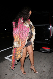 Santa Monica, CA  - *EXCLUSIVE*  - **WEB MUST CALL FOR PRICING** Rihanna flashes huge diamond on THAT finger as she heads to Giorgio Baldi for dinner! The superstar who is expecting her first child with boyfriend A$AP was seen  heading to dinner at  Giorgio Baldi restaurant  with friends in Santa Monica on Tuesday night. The 34-year-old singer is wearing a cat print skin-tight curvy dress, high heeled sandals  and a colorful fur-lined coat. What stood out the most was the huge rock on her left ring finger as she adjusted her necklace. The superstar as been seen wearing the sparkler before but has started now wearing it on the finger typically reserved for an engagement ring. Shot on 03/22/22.  Pictured: Rihanna  BACKGRID USA 23 MARCH 2022  USA: +1 310 798 9111 / usasales@backgrid.com  UK: +44 208 344 2007 / uksales@backgrid.com  *UK Clients - Pictures Containing Children
Please Pixelate Face Prior To Publication*