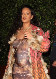 *EXCLUSIVE* Santa Monica, CA  - **WEB MUST CALL FOR PRICING**  Rihanna flashes huge diamond on THAT finger as she heads to Giorgio Baldi for dinner! The superstar who is expecting her first child with boyfriend A$AP was seen  heading to dinner at  Giorgio Baldi restaurant  with friends in Santa Monica on Tuesday night. The 34-year-old singer is wearing a cat print skin-tight curvy dress, high heeled sandals  and a colorful fur-lined coat. What stood out the most was the huge rock on her left ring finger as she adjusted her necklace. The superstar as been seen wearing the sparkler before but has started now wearing it on the finger typically reserved for an engagement ring. Shot on 03/22/22.  Pictured: Rihanna  BACKGRID USA 23 MARCH 2022  USA: +1 310 798 9111 / usasales@backgrid.com  UK: +44 208 344 2007 / uksales@backgrid.com  *UK Clients - Pictures Containing Children
Please Pixelate Face Prior To Publication*