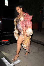 *EXCLUSIVE* Santa Monica, CA  - **WEB MUST CALL FOR PRICING**  Rihanna flashes huge diamond on THAT finger as she heads to Giorgio Baldi for dinner! The superstar who is expecting her first child with boyfriend A$AP was seen  heading to dinner at  Giorgio Baldi restaurant  with friends in Santa Monica on Tuesday night. The 34-year-old singer is wearing a cat print skin-tight curvy dress, high heeled sandals  and a colorful fur-lined coat. What stood out the most was the huge rock on her left ring finger as she adjusted her necklace. The superstar as been seen wearing the sparkler before but has started now wearing it on the finger typically reserved for an engagement ring. Shot on 03/22/22.  Pictured: Rihanna  BACKGRID USA 23 MARCH 2022  USA: +1 310 798 9111 / usasales@backgrid.com  UK: +44 208 344 2007 / uksales@backgrid.com  *UK Clients - Pictures Containing Children
Please Pixelate Face Prior To Publication*