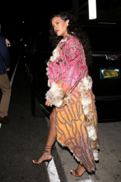 Santa Monica, CA  - *EXCLUSIVE*  - **WEB MUST CALL FOR PRICING** Rihanna flashes huge diamond on THAT finger as she heads to Giorgio Baldi for dinner! The superstar who is expecting her first child with boyfriend A$AP was seen  heading to dinner at  Giorgio Baldi restaurant  with friends in Santa Monica on Tuesday night. The 34-year-old singer is wearing a cat print skin-tight curvy dress, high heeled sandals  and a colorful fur-lined coat. What stood out the most was the huge rock on her left ring finger as she adjusted her necklace. The superstar as been seen wearing the sparkler before but has started now wearing it on the finger typically reserved for an engagement ring. Shot on 03/22/22.  Pictured: Rihanna  BACKGRID USA 23 MARCH 2022  USA: +1 310 798 9111 / usasales@backgrid.com  UK: +44 208 344 2007 / uksales@backgrid.com  *UK Clients - Pictures Containing Children
Please Pixelate Face Prior To Publication*