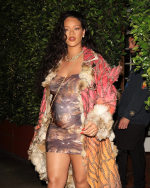 Santa Monica, CA  - *EXCLUSIVE*  - **WEB MUST CALL FOR PRICING**  Rihanna flashes huge diamond on THAT finger as she heads to Giorgio Baldi for dinner! The superstar who is expecting her first child with boyfriend A$AP was seen  heading to dinner at  Giorgio Baldi restaurant  with friends in Santa Monica on Tuesday night. The 34-year-old singer is wearing a cat print skin-tight curvy dress, high heeled sandals  and a colorful fur-lined coat. What stood out the most was the huge rock on her left ring finger as she adjusted her necklace. The superstar as been seen wearing the sparkler before but has started now wearing it on the finger typically reserved for an engagement ring. Shot on 03/22/22.  Pictured: Rihanna  BACKGRID USA 23 MARCH 2022  USA: +1 310 798 9111 / usasales@backgrid.com  UK: +44 208 344 2007 / uksales@backgrid.com  *UK Clients - Pictures Containing Children
Please Pixelate Face Prior To Publication*