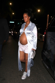 BGUK_2353724 - Los Angeles, CA  - Rihanna's growing baby bump plays peek-a-boo while stepping out for dinner in Los Angeles. The mother-to-be kept it simple yet chic in an open long silk blouse paired with shorts and sneakers.  Pictured: Rihanna  BACKGRID UK 9 APRIL 2022  BYLINE MUST READ: iamKevinWong.com / BACKGRID  UK: +44 208 344 2007 / uksales@backgrid.com  USA: +1 310 798 9111 / usasales@backgrid.com  *UK Clients - Pictures Containing Children
Please Pixelate Face Prior To Publication*