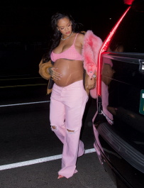 Mandatory Credit: Photo by Diggzy/Shutterstock (12891363b)
Rihanna wore a pink faux fox across her shoulder as she arrived at the Nice Guy in Hollywood. She wore a pink bra top and a construction jacket as she made her way inside, gently cradling her growing baby bump
Rihanna Gently Cradles Her Baby Bump as She Arrives at The Nice Guy to Celebrate Her BFF Melissa Forde's Birthday, Los Angeles, California, USA - 12 Apr 2022