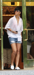 Rihanna leaves her midtown hotel wearing ripped short shorts and an orange halter top under a white blouse. She was sporting what may be a new tattoo--a Skull & Crossbones with a red bow--on the back of her left ankle.  she took photos and signed autographs for fans.
<p>
Pictured: Rihanna
<b>Ref: SPL110150  290609   EXCLUSIVE</b><br />
Picture by: Lawrence Schwartzwald <br />
</p><p>
<b>Splash News and Pictures</b><br />
Los Angeles:	310-821-2666<br />
New York:	212-619-2666<br />
London:	870-934-2666<br />
photodesk@splashnews.com<br />
</p>