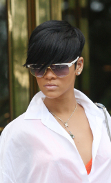 Rihanna leaves her midtown hotel wearing ripped short shorts and an orange halter top under a white blouse. She was sporting what may be a new tattoo--a Skull & Crossbones with a red bow--on the back of her left ankle.  she took photos and signed autographs for fans.
<p>
Pictured: Rihanna
<b>Ref: SPL110150  290609   EXCLUSIVE</b><br />
Picture by: Lawrence Schwartzwald <br />
</p><p>
<b>Splash News and Pictures</b><br />
Los Angeles:	310-821-2666<br />
New York:	212-619-2666<br />
London:	870-934-2666<br />
photodesk@splashnews.com<br />
</p>
