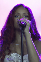 PARIS, FRANCE - MAY 06:  Rihanna performs live at the 'Nivea And Rihanna Celebrating 100 Years Of Skincare' at Grand Hotel Intercontinental on May 6, 2011 in Paris, France.  (Photo by Marc Piasecki/WireImage)