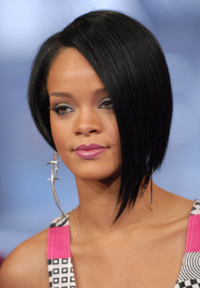 Rihanna during Zach Braff And Rihanna Visit MTV's TRL - May 9, 2007 at MTV Studios in New York City, New York, United States. (Photo by Jason Kempin/FilmMagic)