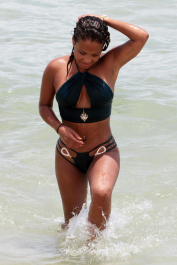 Miami, FL  - Actress, singer, model and movie star Christina Milian is spotted showing off her bikini body while enjoying a day on the beach in Miami, Florida with friends. After cooling off in the water Christina headed for the shade to chill out with her crew.  Pictured: Christina Milian  BACKGRID USA 20 JULY 2017  BYLINE MUST READ: FAMA / BACKGRID  USA: +1 310 798 9111 / usasales@backgrid.com  UK: +44 208 344 2007 / uksales@backgrid.com  *UK Clients - Pictures Containing Children
Please Pixelate Face Prior To Publication*