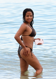 , Miami, FL - 7/18/2017 - Christina Milian laughs off a wardrobe malfunction as she exposes her nipple ring while trying to take the perfect bikini selfie in the ocean in Miami. The singer was wearing a black string bikini that showed off her curves while relaxing with family on the beach.  -PICTURED: Christina Milian
-PHOTO by: INSTARimages.com
-Instar_Christina_Milian_Accidentally_10011211670  Editorial Rights Managed Image - Please contact www.INSTARimages.com for licensing fee and rights: North America Inquiries: email sales@instarimages.com or call 212.414.0207 - UK Inquiries: email ben@instarimages.com or call + 7715 698 715 - Australia Inquiries: email sarah@instarimages.com.au Êor call +02 9660 0500 Ð for any other Country, please email sales@instarimages.com. ÊImage or video may not be published in any way that is or might be deemed defamatory, libelous, pornographic, or obscene / Please consult our sales department for any clarification or question you may have - http://www.INSTARimages.com reserves the right to pursue unauthorized users of this image or video. If you are in violation of our intellectual property you may be liable for actual damages, loss of income, and profits you derive from the use of this image or video, and where appropriate, the cost of collection and/or statutory damage.
