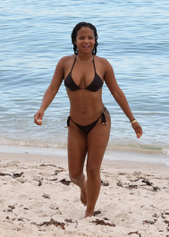 , Miami, FL - 7/18/2017 - Christina Milian laughs off a wardrobe malfunction as she exposes her nipple ring while trying to take the perfect bikini selfie in the ocean in Miami. The singer was wearing a black string bikini that showed off her curves while relaxing with family on the beach.  -PICTURED: Christina Milian
-PHOTO by: INSTARimages.com
-Instar_Christina_Milian_Accidentally_10011211765  Editorial Rights Managed Image - Please contact www.INSTARimages.com for licensing fee and rights: North America Inquiries: email sales@instarimages.com or call 212.414.0207 - UK Inquiries: email ben@instarimages.com or call + 7715 698 715 - Australia Inquiries: email sarah@instarimages.com.au Êor call +02 9660 0500 Ð for any other Country, please email sales@instarimages.com. ÊImage or video may not be published in any way that is or might be deemed defamatory, libelous, pornographic, or obscene / Please consult our sales department for any clarification or question you may have - http://www.INSTARimages.com reserves the right to pursue unauthorized users of this image or video. If you are in violation of our intellectual property you may be liable for actual damages, loss of income, and profits you derive from the use of this image or video, and where appropriate, the cost of collection and/or statutory damage.