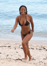 , Miami, FL - 7/18/2017 - Christina Milian laughs off a wardrobe malfunction as she exposes her nipple ring while trying to take the perfect bikini selfie in the ocean in Miami. The singer was wearing a black string bikini that showed off her curves while relaxing with family on the beach.  -PICTURED: Christina Milian
-PHOTO by: INSTARimages.com
-Instar_Christina_Milian_Accidentally_10011211770  Editorial Rights Managed Image - Please contact www.INSTARimages.com for licensing fee and rights: North America Inquiries: email sales@instarimages.com or call 212.414.0207 - UK Inquiries: email ben@instarimages.com or call + 7715 698 715 - Australia Inquiries: email sarah@instarimages.com.au Êor call +02 9660 0500 Ð for any other Country, please email sales@instarimages.com. ÊImage or video may not be published in any way that is or might be deemed defamatory, libelous, pornographic, or obscene / Please consult our sales department for any clarification or question you may have - http://www.INSTARimages.com reserves the right to pursue unauthorized users of this image or video. If you are in violation of our intellectual property you may be liable for actual damages, loss of income, and profits you derive from the use of this image or video, and where appropriate, the cost of collection and/or statutory damage.